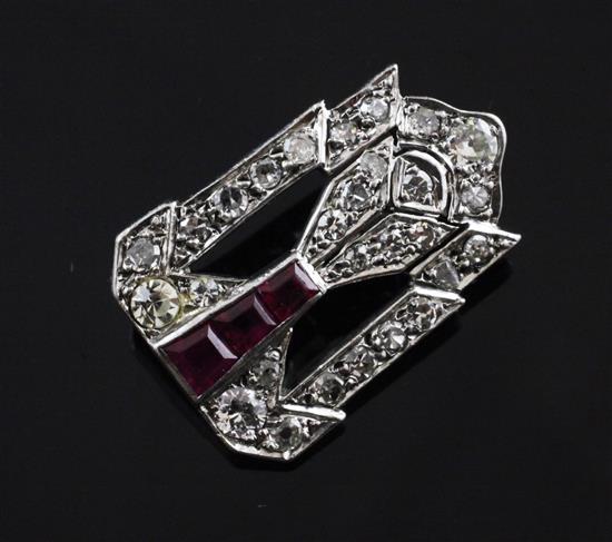 A 1920s/1930s Art Deco platinum, ruby and diamond set brooch, 1in.